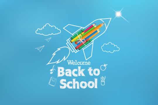 A rocket made of pencils flies in the sky and says, “welcome back to school!”