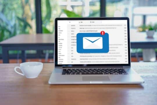 A portrait of a laptop with an email icon on it, representing a teacher email.