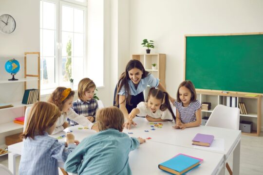 A teacher and her students play a game, bringing gamification to the classroom.